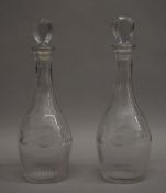 A pair of 19th century decanters. 30 cm high.