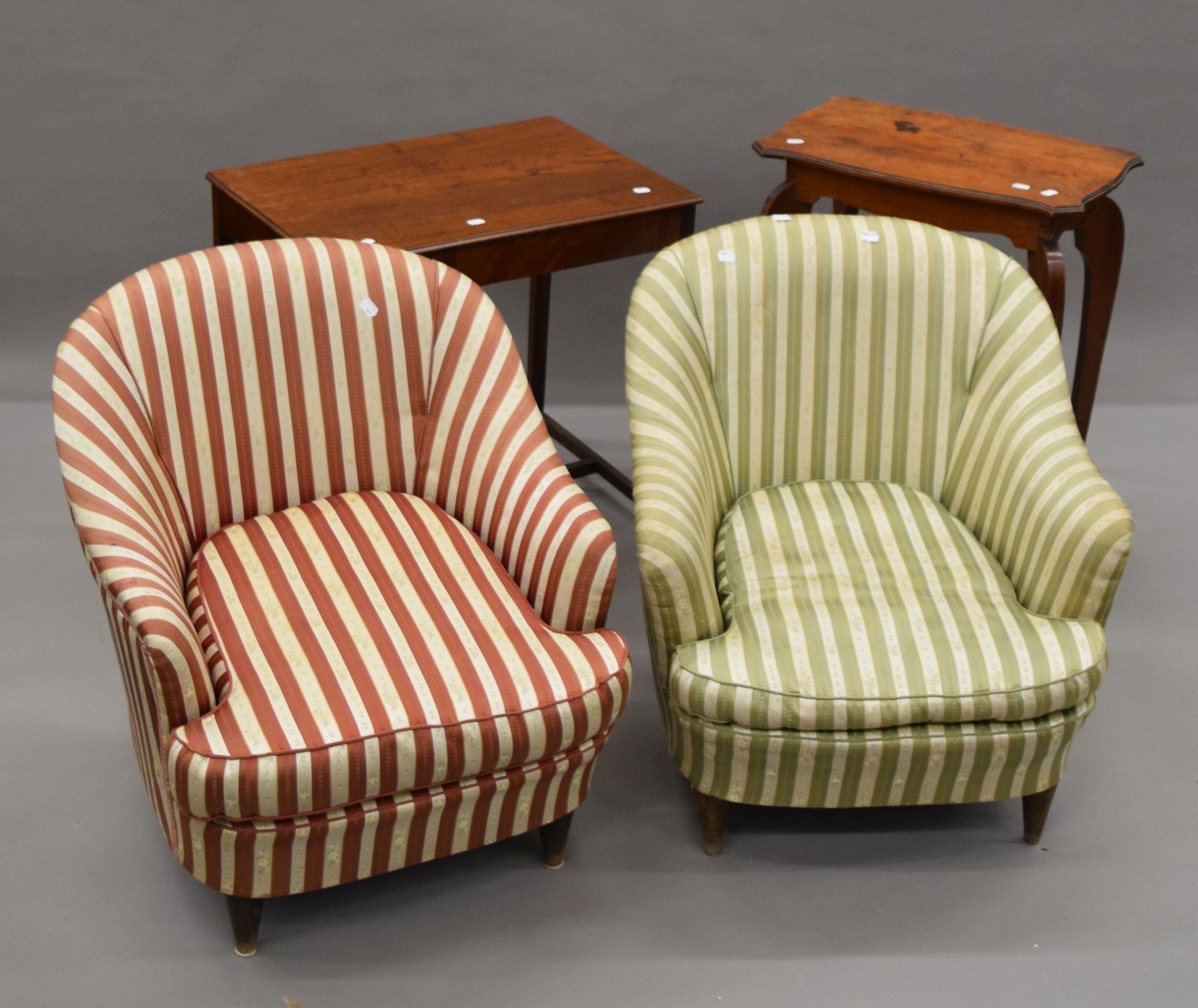 A Victorian mahogany side table, a walnut side table and a pair of arm chairs. The former 64.