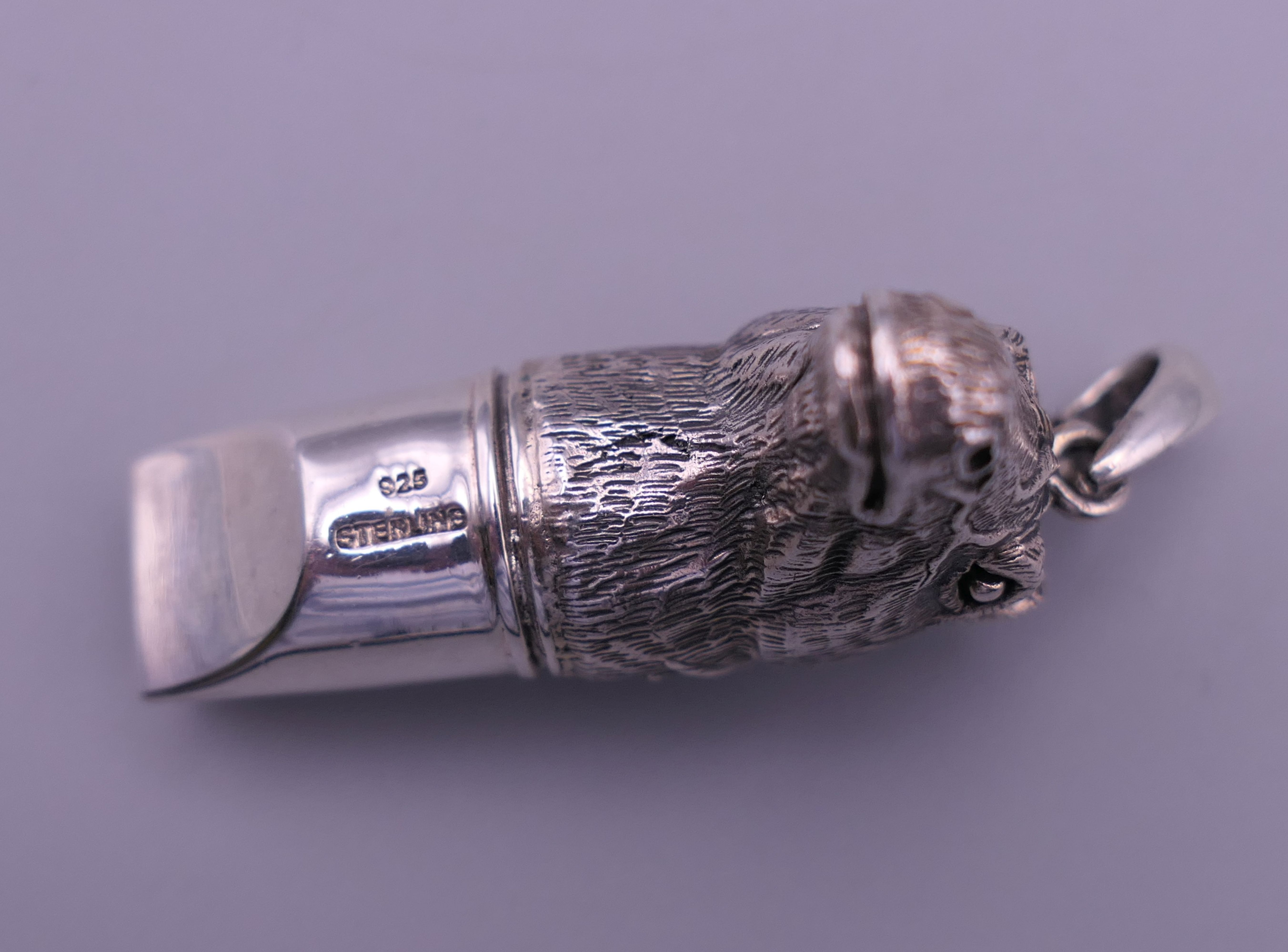 A 925 silver whistle in the form of a horse's head. 4 cm high excluding suspension loop. - Image 3 of 6