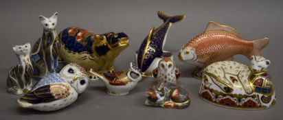 A collection of ten Royal Crown Derby paperweights. The largest 13.5 cm high.