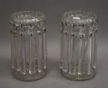 A pair of Victorian clear glass lustres. 23 cm high.