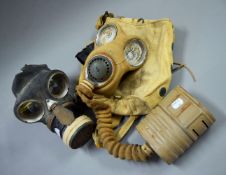 Two vintage gas masks.