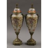 A pair of decorative vases. 37 cm high.