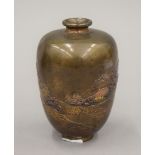 A Meiji Period Japanese gold inlaid bronze vase. 11 cm high.