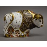 A Royal Crown Derby limited edition North American bison paperweight with gold mark. 11 cm high.