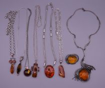 A quantity of silver and amber jewellery. 255.1 grammes total weight.