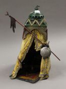 A cold painted bronze model of a North African tent. 31 cm high.