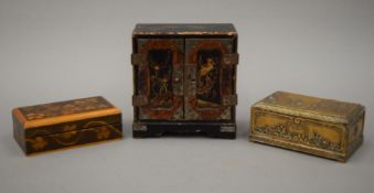 A miniature Japanese lacquered cabinet, a French Delletrez Paris Esora perfume box and another box.
