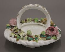 A 19th century Continental flower encrusted porcelain bowl. 17 cm diameter.