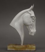 A Michael Sutty porcelain horse head. 20 cm high.