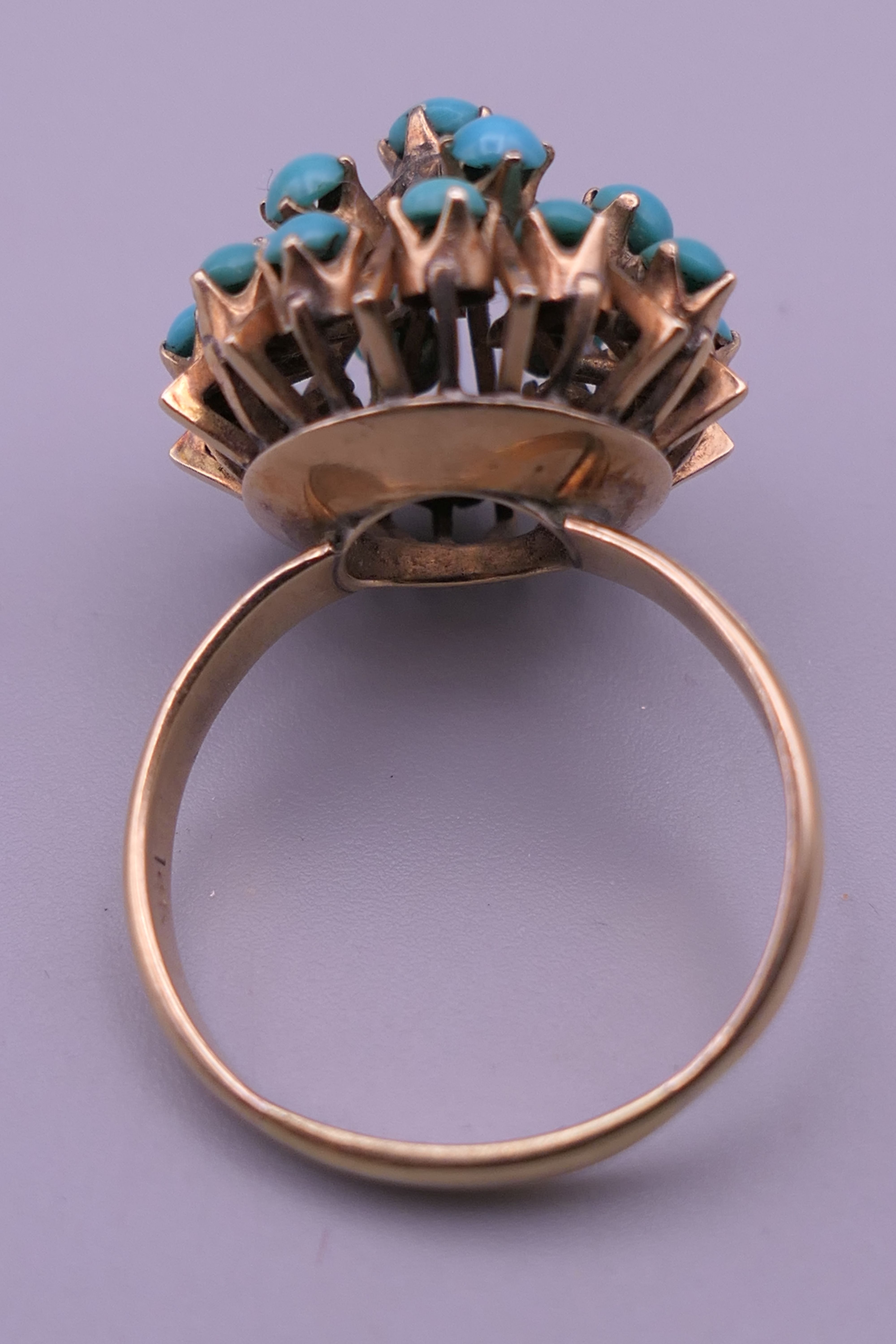 A 14 K gold and turquoise ring. Ring size U. 7.5 grammes total weight. - Image 7 of 8