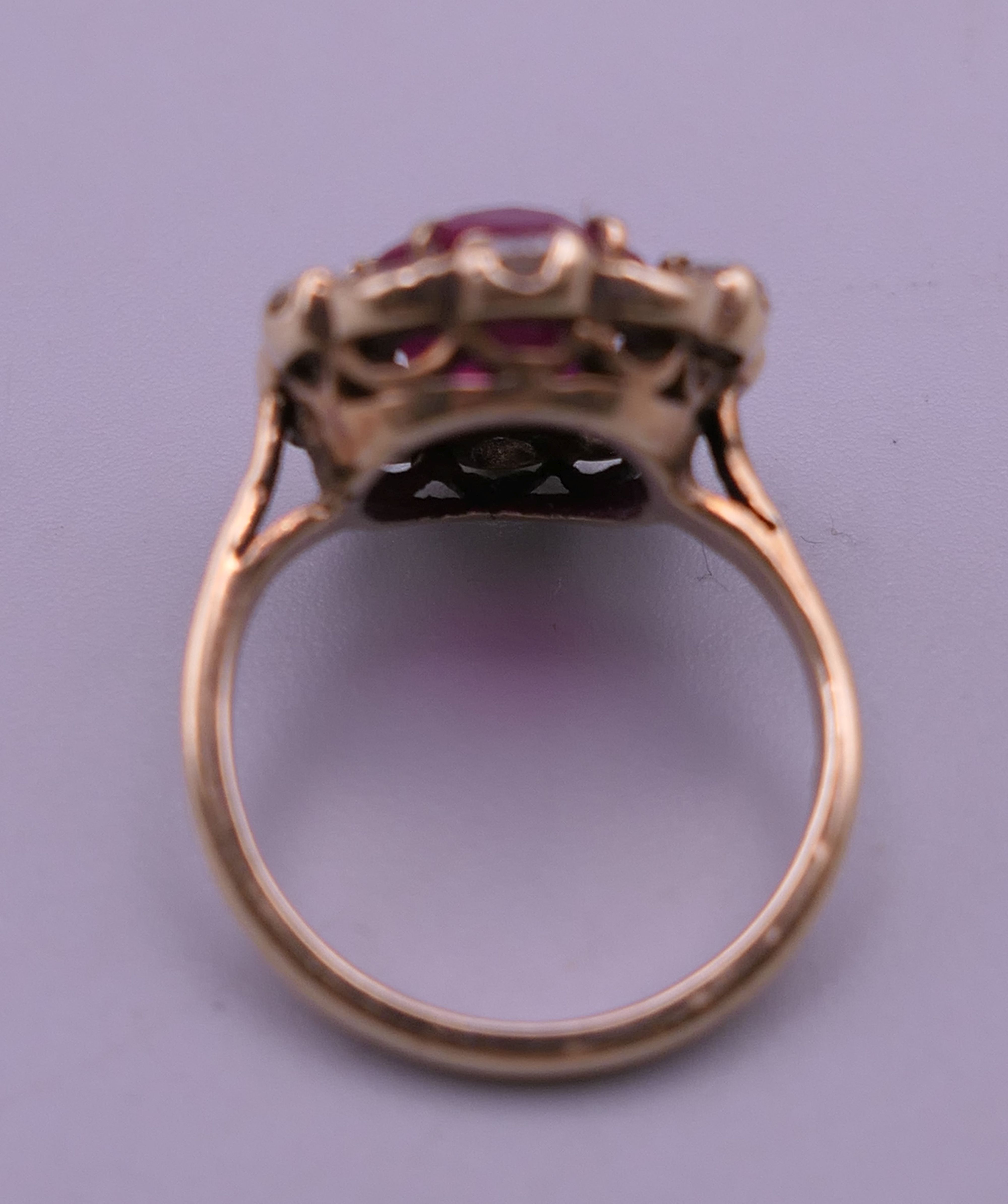 A 9 ct gold red stone ring. Ring size H. - Image 3 of 6