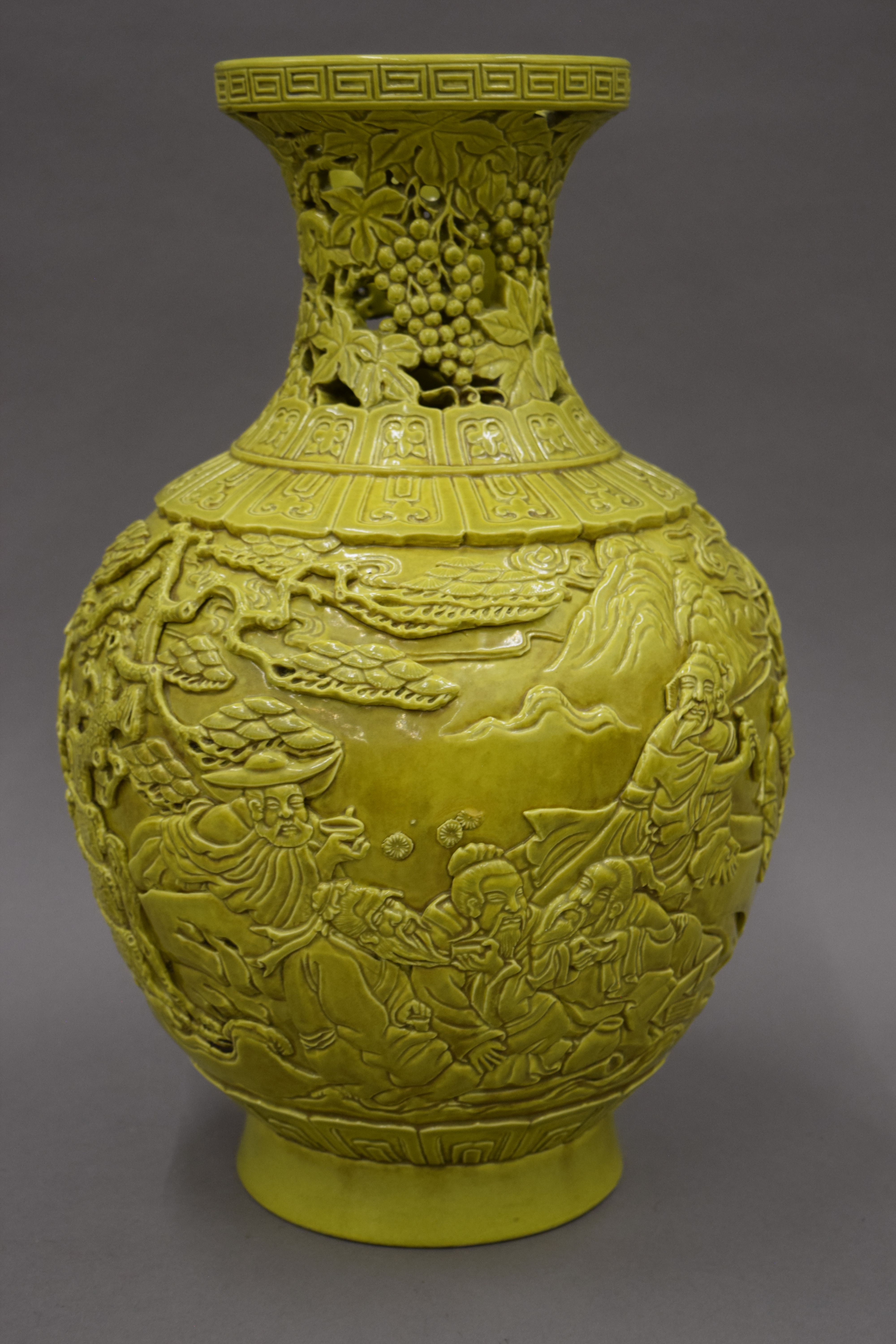 A Chinese olive green vase of reticulated form with Qianlong seal mark to base and decorated with - Image 3 of 6