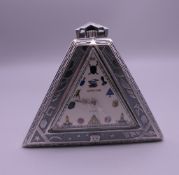 A Masonic (decorated) pocket watch. 5 cm high.