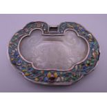 A Chinese unmarked silver enamel and jade buckle. 8 cm wide.