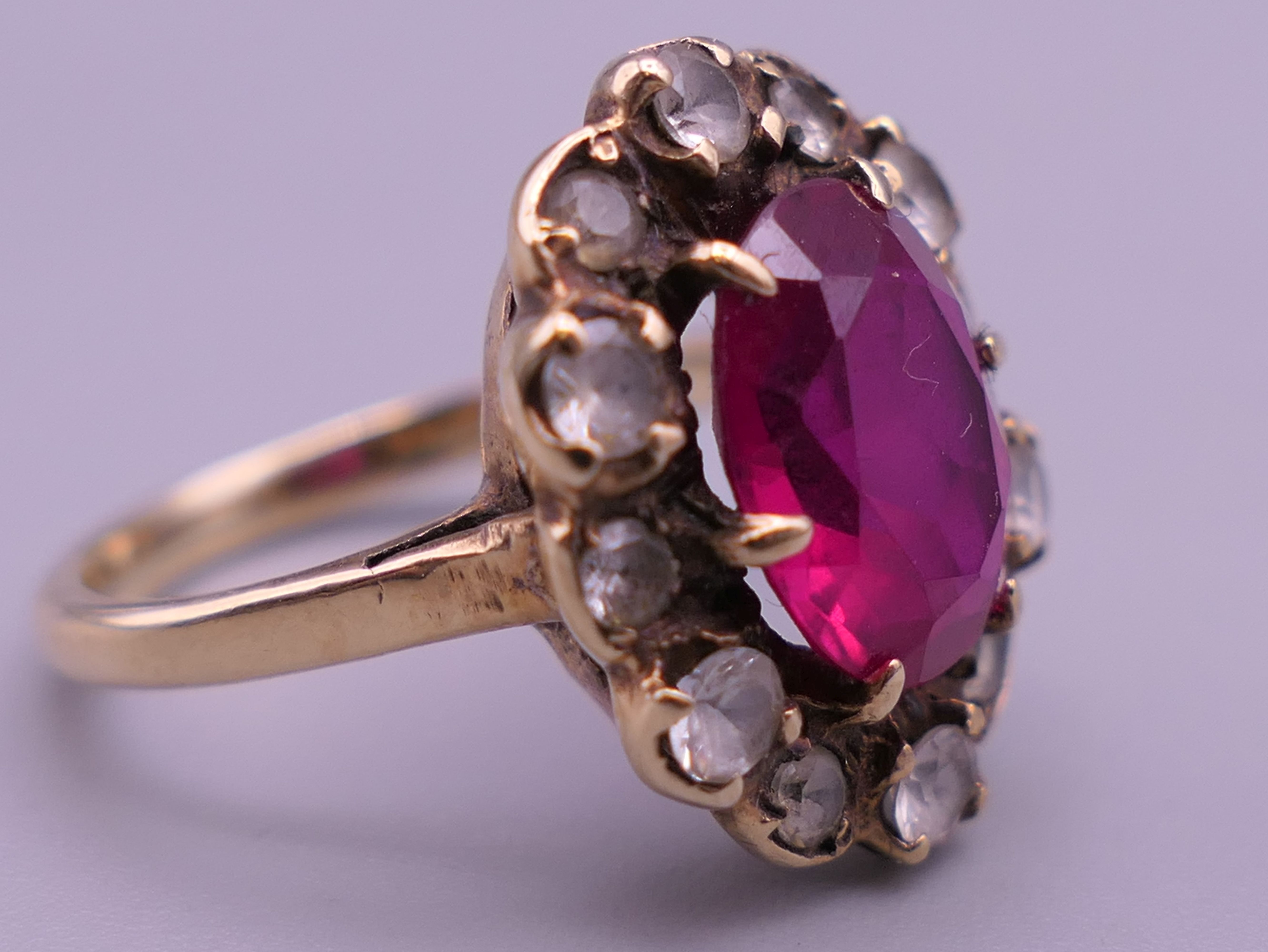A 9 ct gold red stone ring. Ring size H. - Image 4 of 6