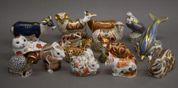 A collection of Royal Crown Derby paperweights. The largest 11 cm high.