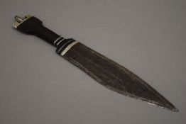 An Eastern horn handled knife. 35 cm long.