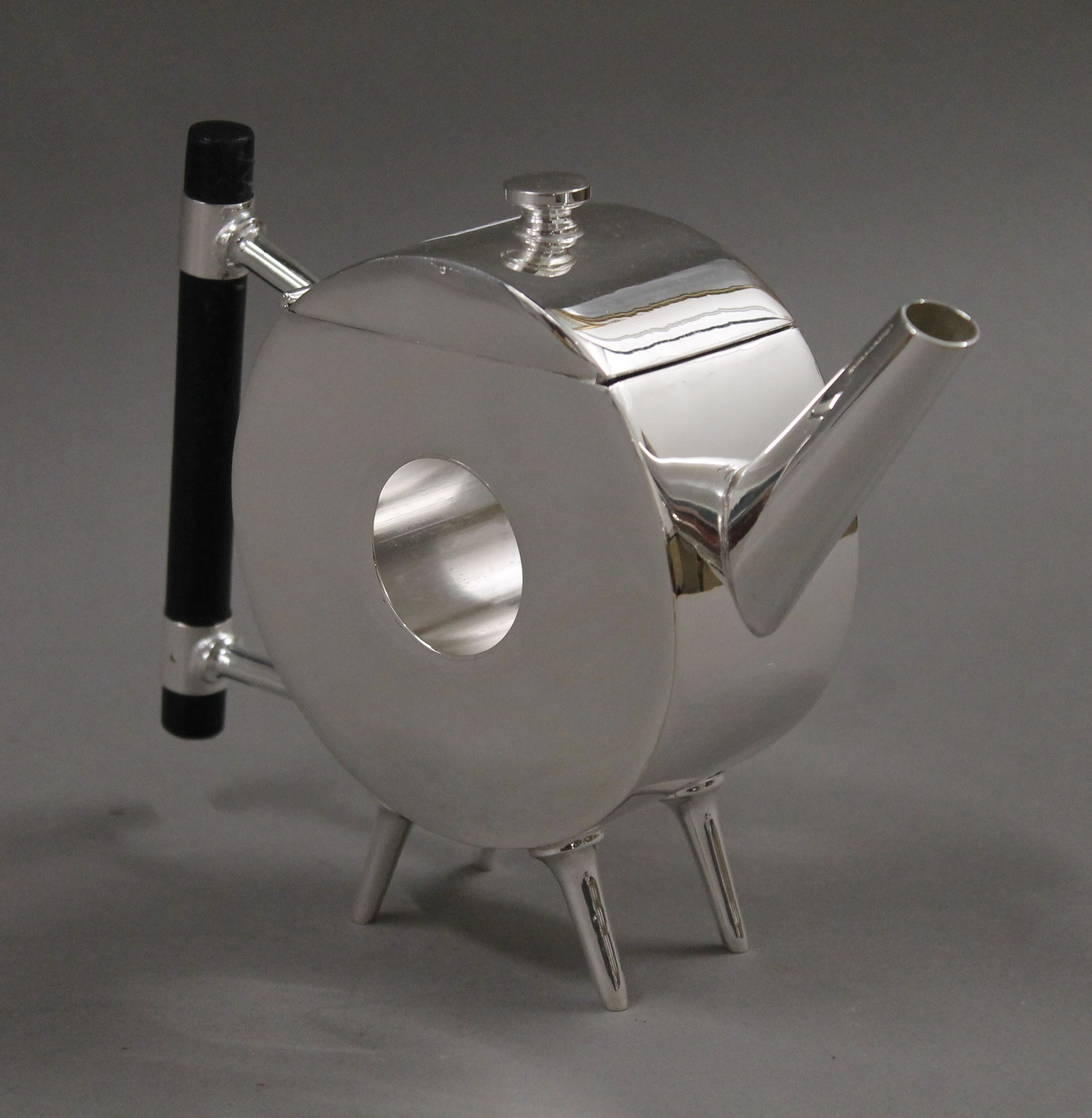 A Christopher Dresser style teapot. 13.5 cm high. - Image 2 of 3
