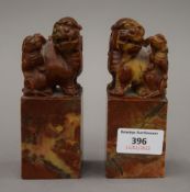 A pair of Chinese seals carved with dogs of fo. 13 cm high.