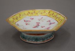 A 19th century Canton porcelain footed dish. 12.5 cm wide.