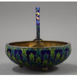 A Russian silver and enamel basket. 10.5 cm diameter. 193.4 grammes total weight.