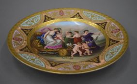 A 19th century Vienna painted porcelain plate decorated with Der Wagen der Venus. 24.5 cm diameter.