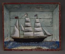 A painted wooden diorama of the masted ship ''Dauntless''. 74.5 cm wide.