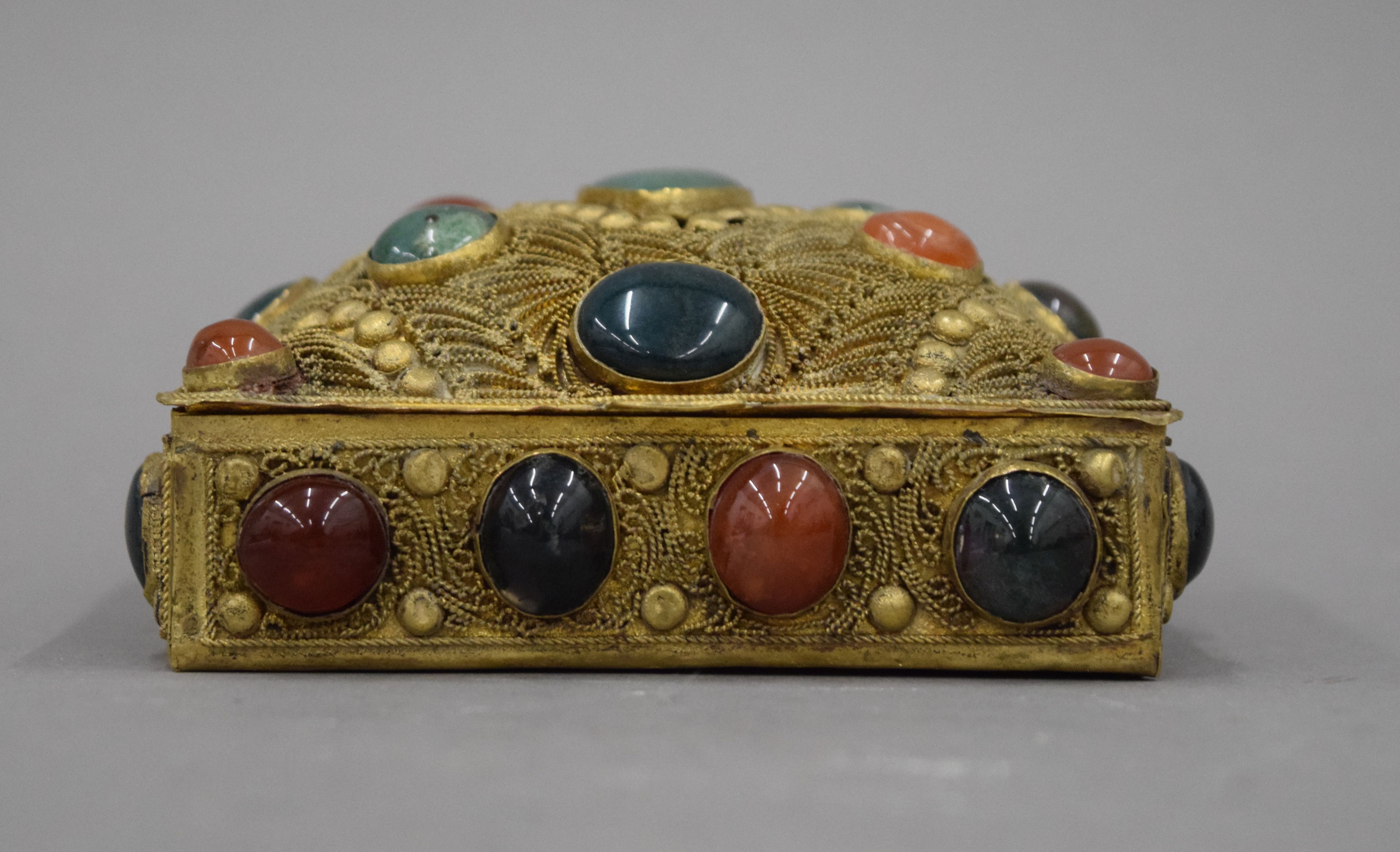 An Indian gilt box set with cabochon stones. 11 cm wide. - Image 2 of 4