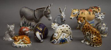 A collection of ten Royal Crown Derby paperweights. The largest 15.5 cm high.