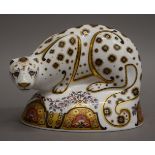 A Royal Crown Derby snow leopard paperweight. 12 cm high.