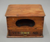 A Victorian pitch pine ballot box. 25 cm wide.