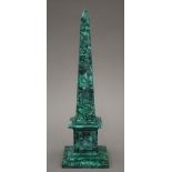 A malachite obelisk. 29 cm high.