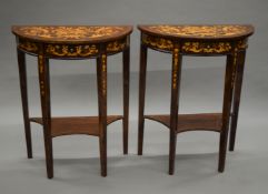 A pair of marquetry inlaid demi lune side tables. 60 cm wide.