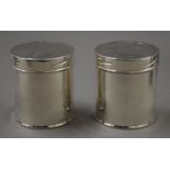 A pair of Mappin and Webb silver caddies. 8 cm high. 228.7 grammes.