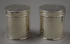 A pair of Mappin and Webb silver caddies. 8 cm high. 228.7 grammes.