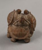 A Japanese box formed as a turtle. 8 cm high.