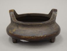 A Chinese bronze censer, the base with four character Xuande mark. 14 cm wide.