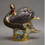 A large Royal Crown Derby limited edition black swan paperweight with gold mark. 23 cm high.