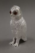 A silver plated owl form sugar sifter (lid currently stuck). 14.5 cm high.