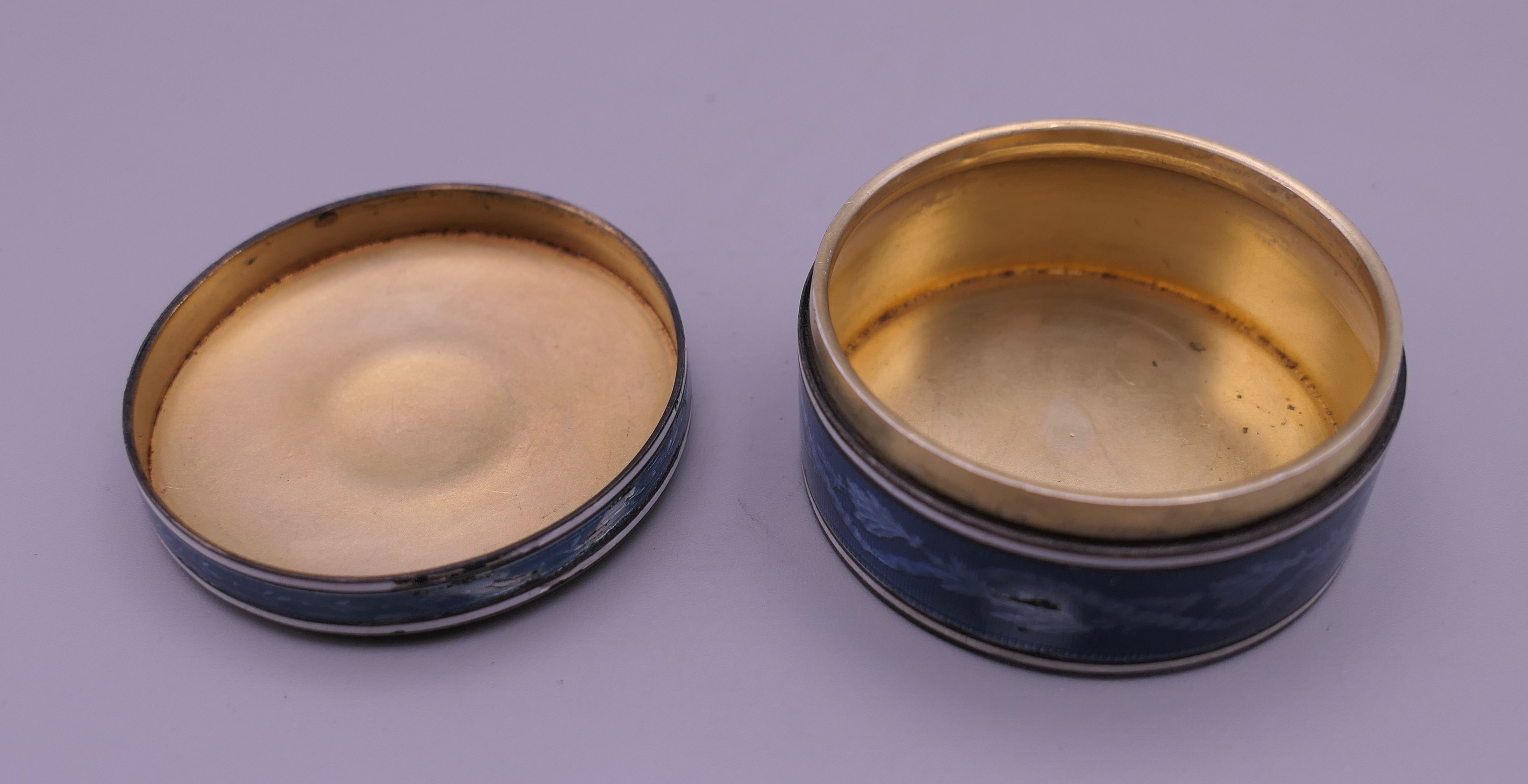 A Continental blue enamel decorated silver box. 4.5 cm diameter. - Image 2 of 9