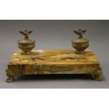 A bronze mounted Sienna marble desk stand. 36 cm wide.