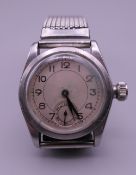 An early Rolex Oyster wristwatch on associated strap. 3.5 cm wide.