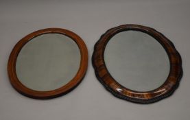 An Edwardian line inlaid mahogany bevelled mirror and another. The former 49 x 71.5 cm.
