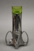 A WMF style bud vase with green glass liner. 26.5 cm high.