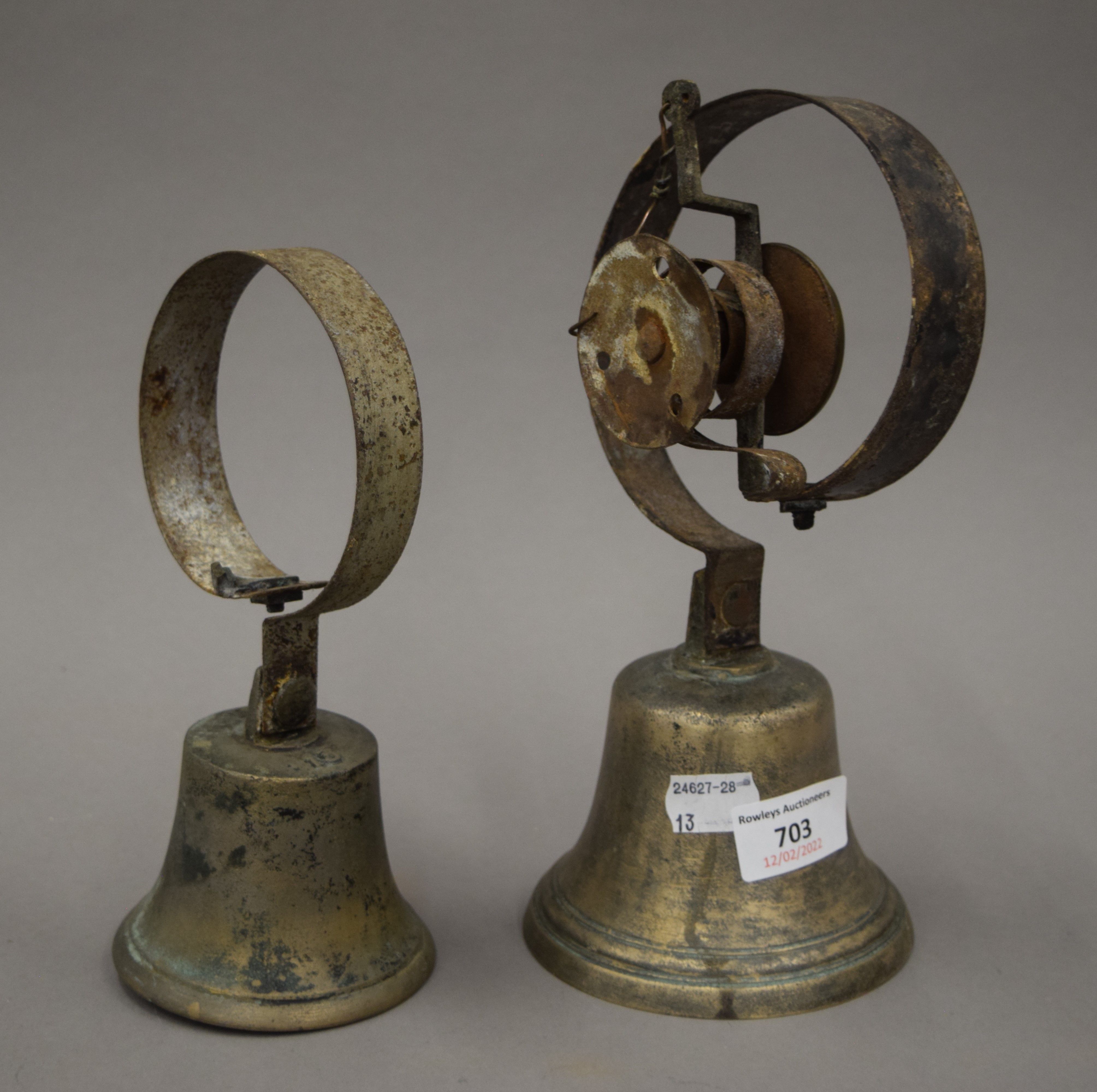 Two Victorian shop bells. The largest 23 cm high overall.