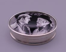 A sterling silver Sherlock Holmes pill box. 3.5 cm wide.