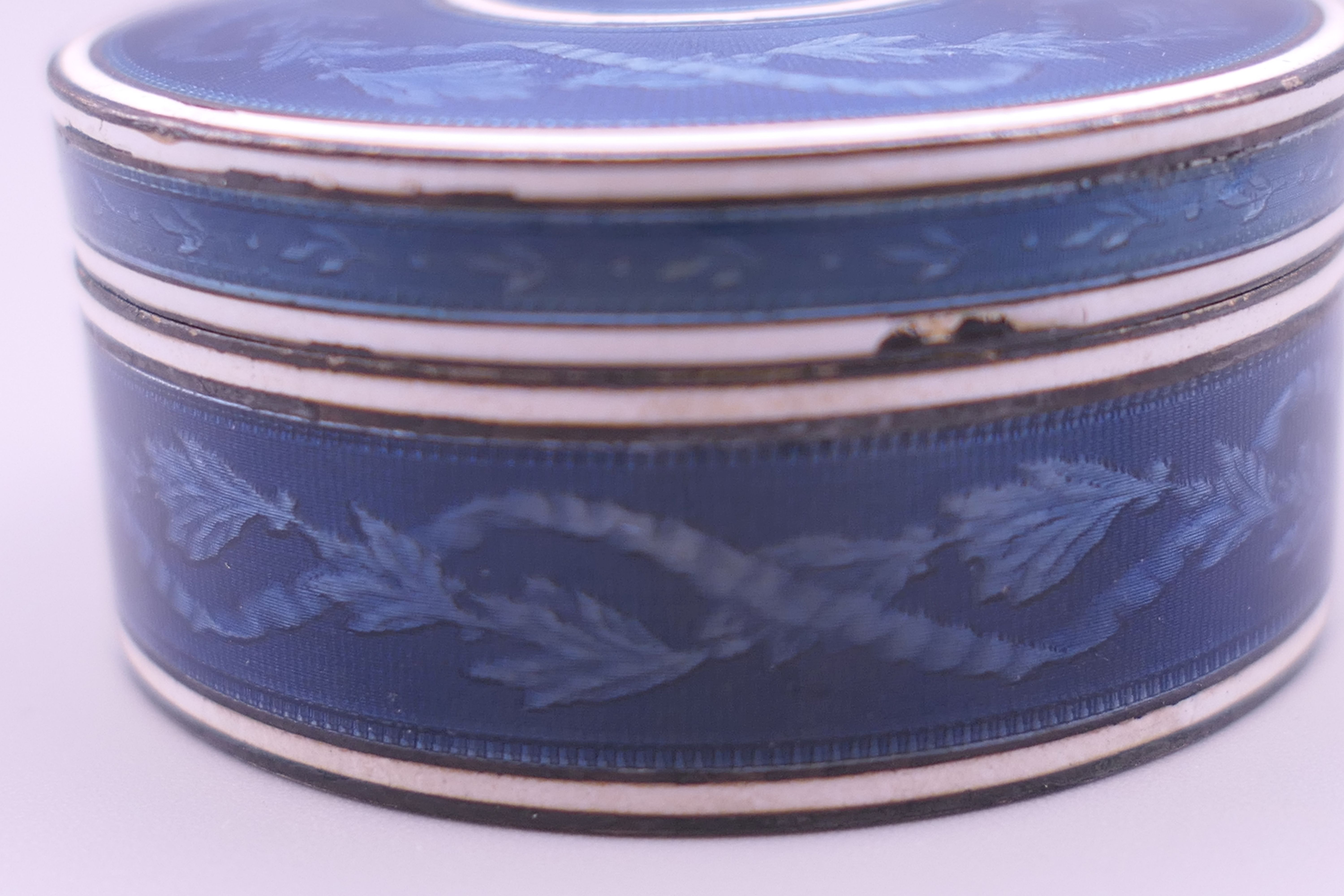 A Continental blue enamel decorated silver box. 4.5 cm diameter. - Image 5 of 9