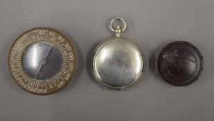 Three various compasses.