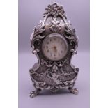 A Continental unmarked silver desk clock. 11.5 cm high.